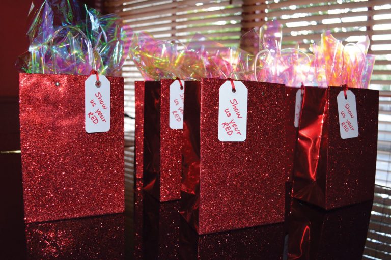The glittering goodie bags featured a special red gift for each guest