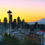 Western-Adventure_10558483-emerald-city-of-seattle-waking-up-in-a-bright-colorful-sunrise-mt-rainier-towering-in-the-background