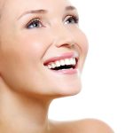 Beautiful-Teeth_5769540-happy-laughing-woman-portrait-with-a-white-healthy-teeth–isolated-on-white