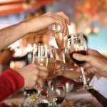 Good-TimeS_2475817-celebration-hands-holding-the-glasses-of-champagne-and-wine-making-a-toast