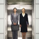 Page-6_6434066-businesswomen-in-elevator