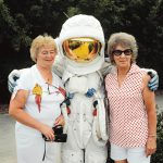 Tourists to the Kennedy Space Center in Orlando, Florida posing