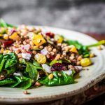 Healthy salad with spinach,quinoa and roasted vegetables