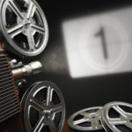 Cinema, movie or video concept. Vintage projector with projectin