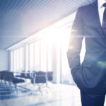 Busineesman in sunny office