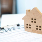 contract sign with house toy shape,concept of real estate and ho
