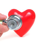 2801670 – a red heart shape and a medical stethoscope.