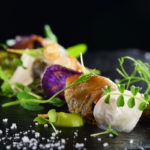 Haute cuisine, Gourmet food scallops with asparagus and lardo bacon